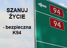 tablica drogowa z numerem drogi, obok napis Szanuj życie - bezpieczna K94