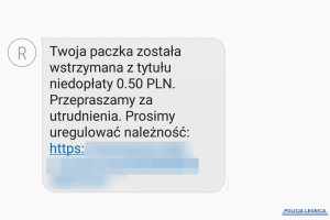 napis Twoja paczka zostaje wstrzymana z tytułu niedopłaty 0,50 PLN. Przepraszamy za utrudnienia. Prosimy uregulować należność.